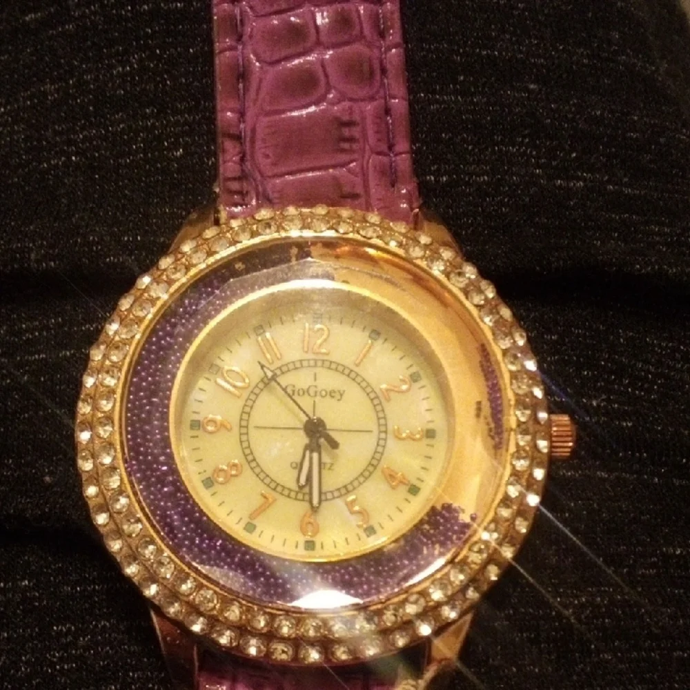Elegant Women's Watch with Purple Strap and Gold Detailing